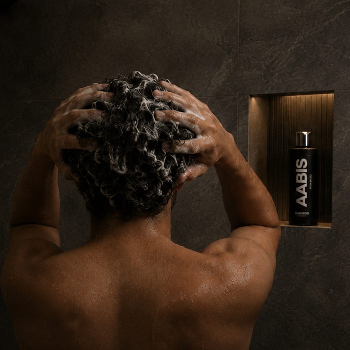 Massaging shampoo into the scalp